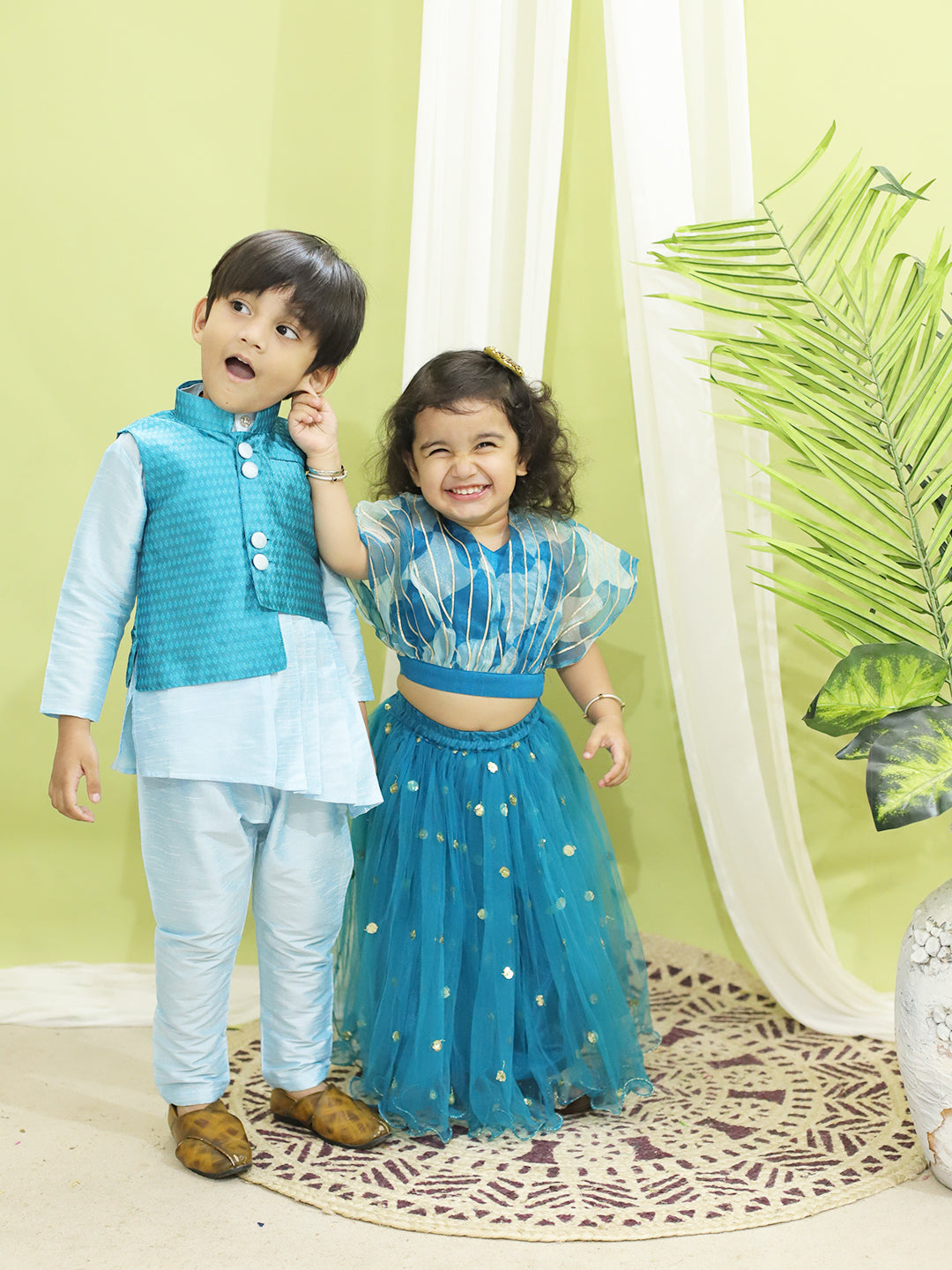 BownBee Assymetric Kurta Pajama with Jacquard Jacket for Boys and Organza Cape Top with Sequined Net Lehenga for Girls- Blue