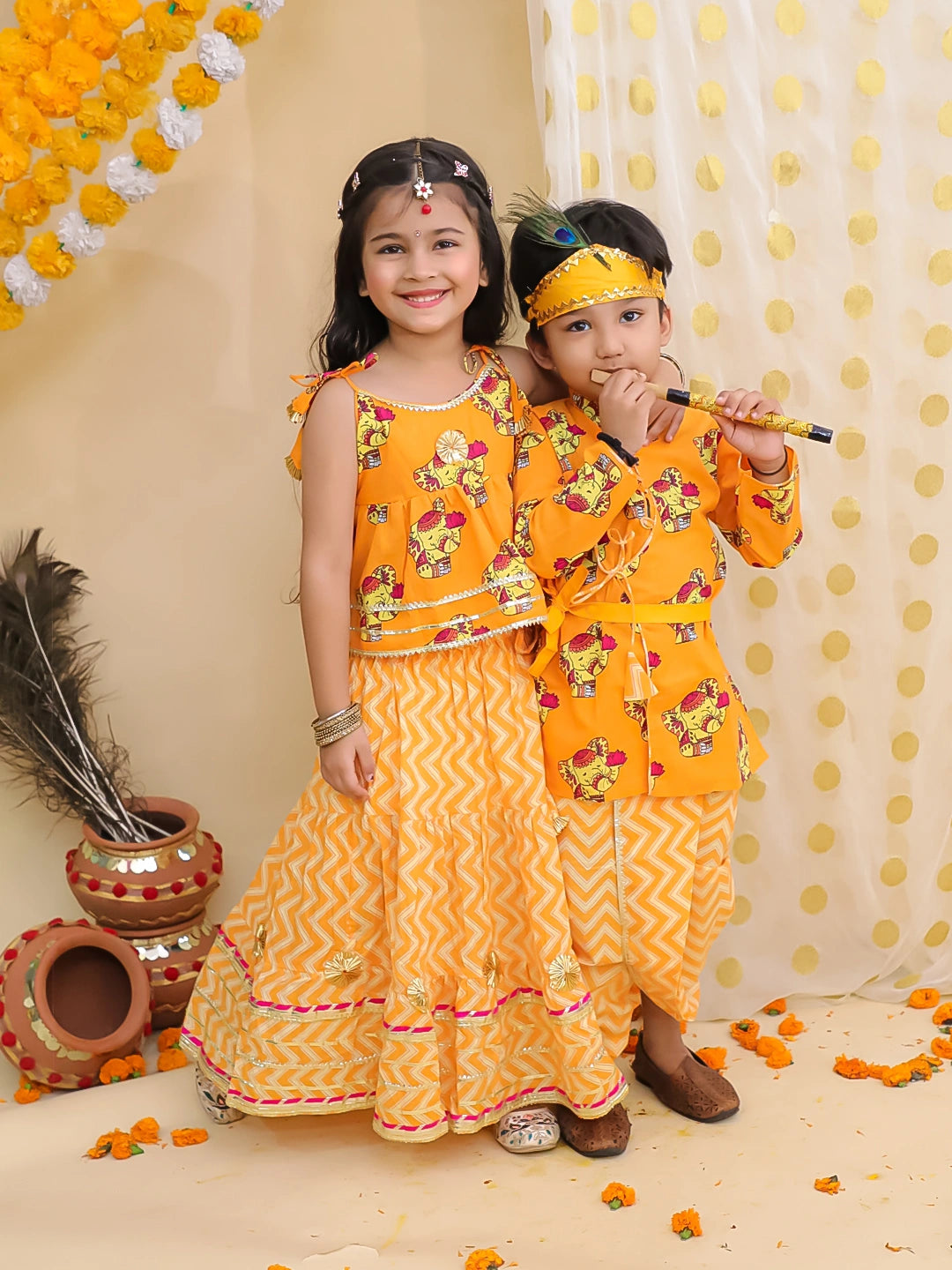 BownBee Festive Quirky Printed  Kanhaiya Dhoti Kurta With Lehenga Choli Sibling Set - Orange