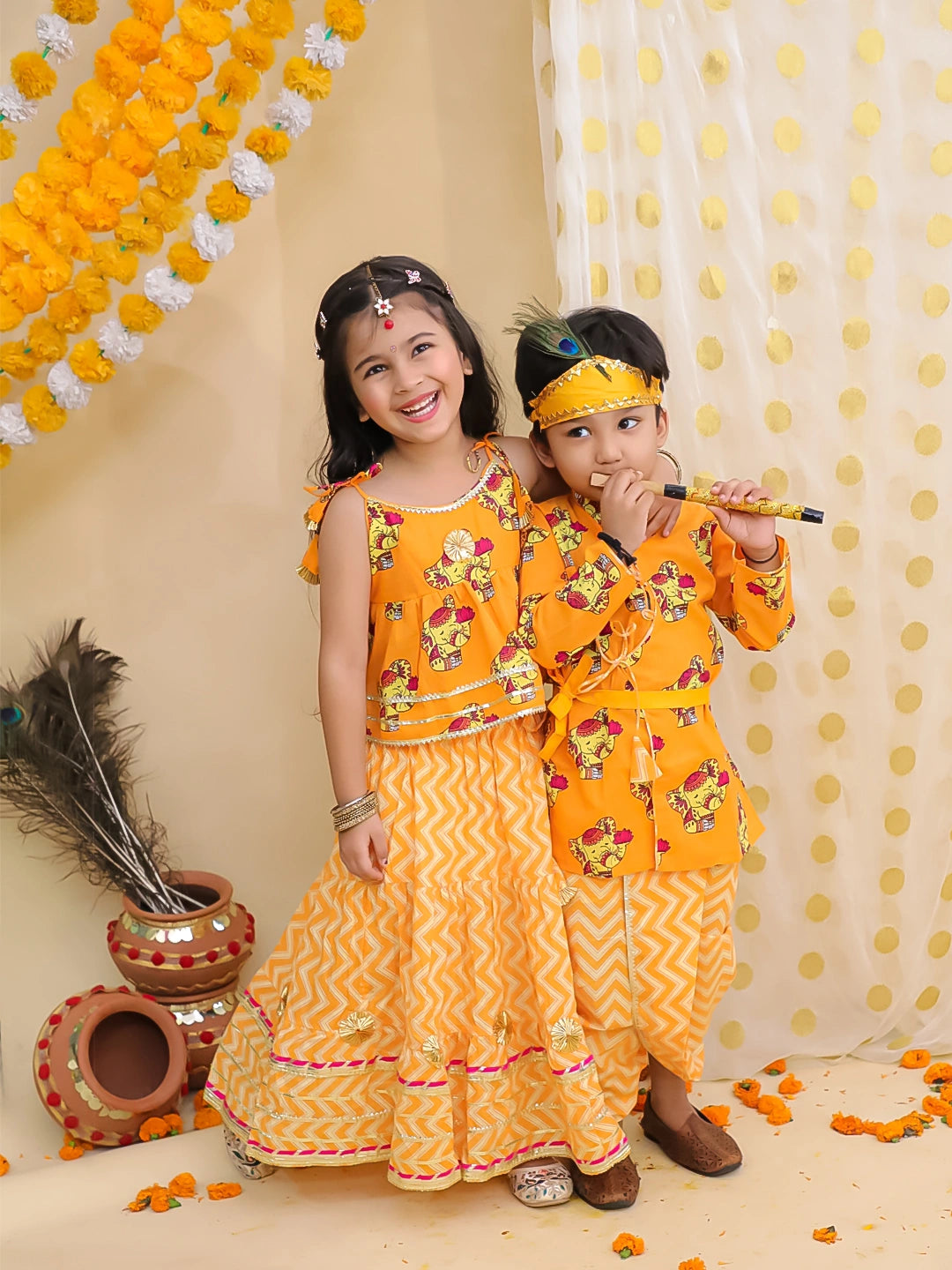 BownBee Festive Quirky Printed  Kanhaiya Dhoti Kurta With Lehenga Choli Sibling Set - Orange