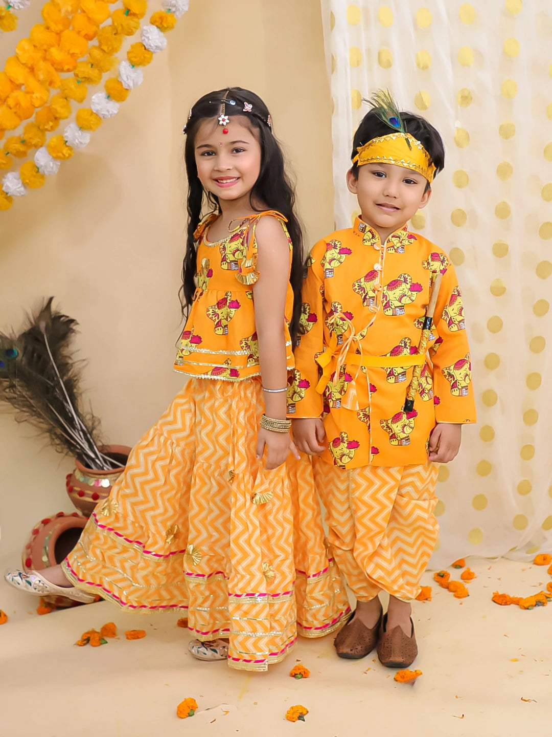BownBee Festive Quirky Printed  Kanhaiya Dhoti Kurta With Lehenga Choli Sibling Set - Orange