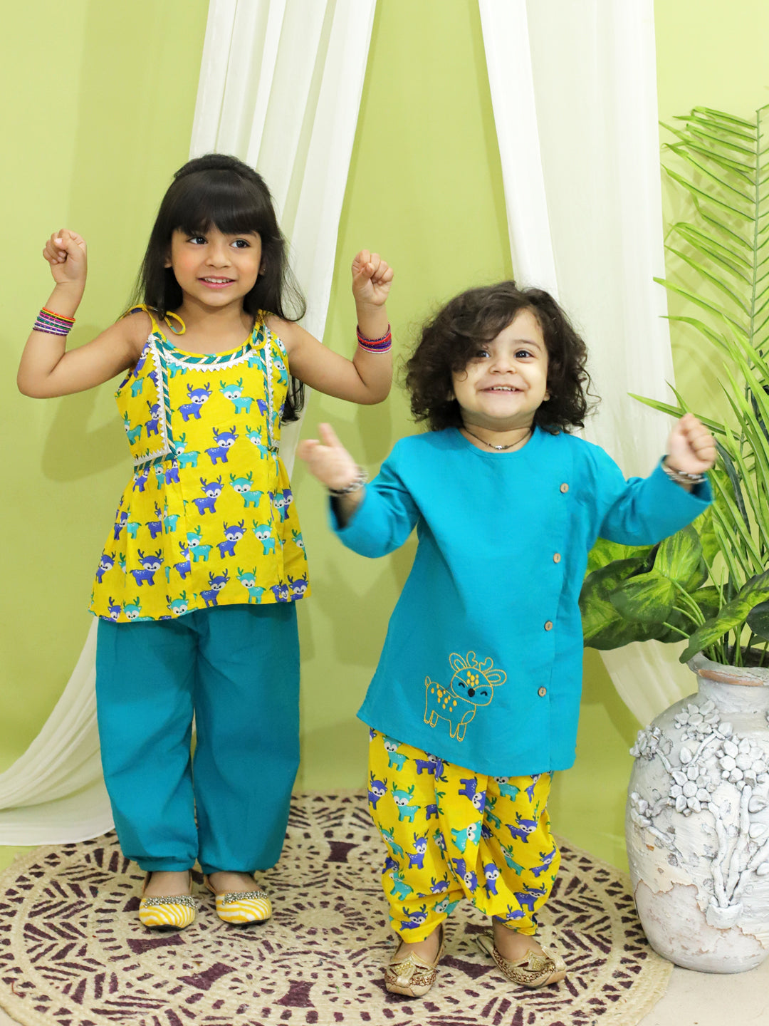 BownBee Embroidered Pure Cotton Green Kurta with Printed Dhoti for Boys and Deer Print Yellow Pure Cotton Top Harem Set for Girls